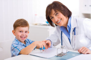 Senior female pediatrician playing with child at doctors office. Click here for more Medical photos [url=my_lightbox_contents.php?lightboxID=1510286][img]http://www.nitorphoto.com/istocklightbox/medical.jpg[/img][/url] [url=my_lightbox_contents.php?lightboxID=3334296][img]http://www.nitorphoto.com/istocklightbox/medicalportraits.jpg[/img][/url]